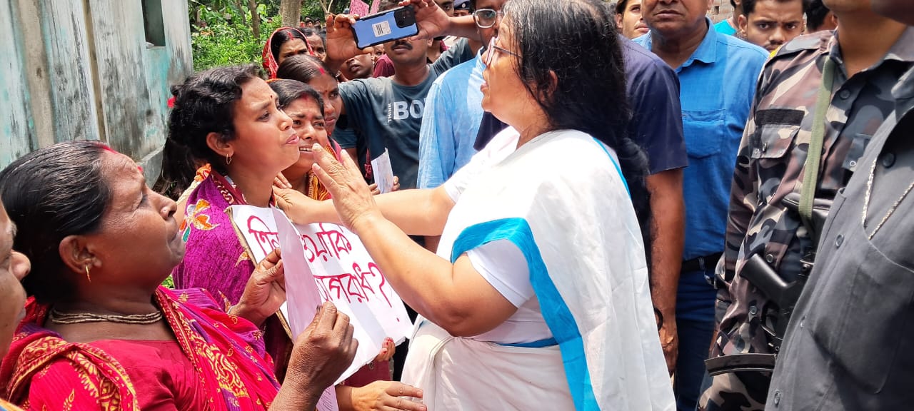 A group of women in a supportive community setting